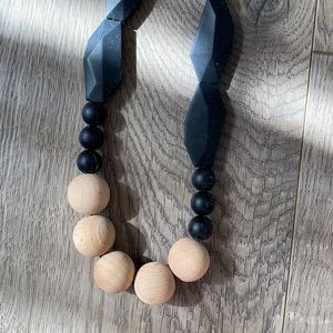 Teething necklace. Wood and silicon. Never used.
